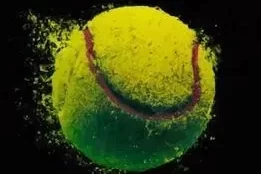 Does the mass of a tennis ball change over time 