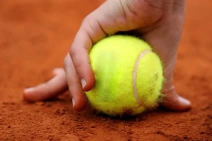 What Is The Mass Of A Tennis Ball? 